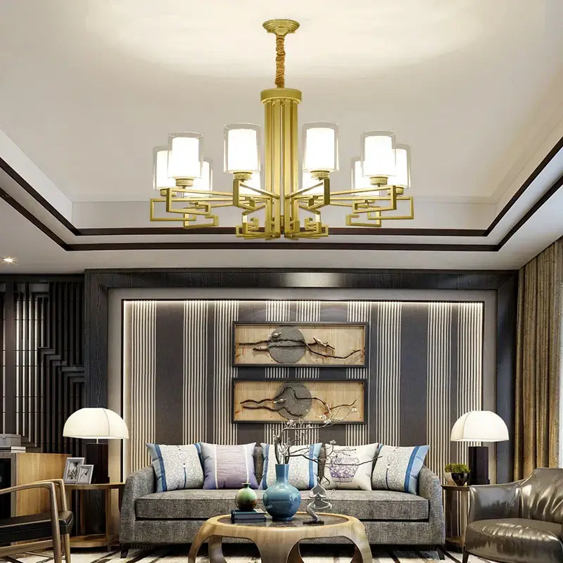 Modern gold geometric chandelier with frosted glass shades designed for luxury living room lighting