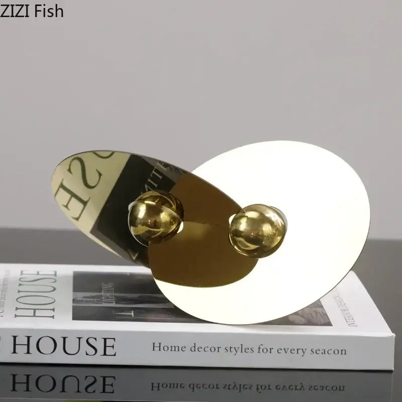 Modern gold geometric circle sculpture with reflective discs and spherical accents metal ornament for living room decor