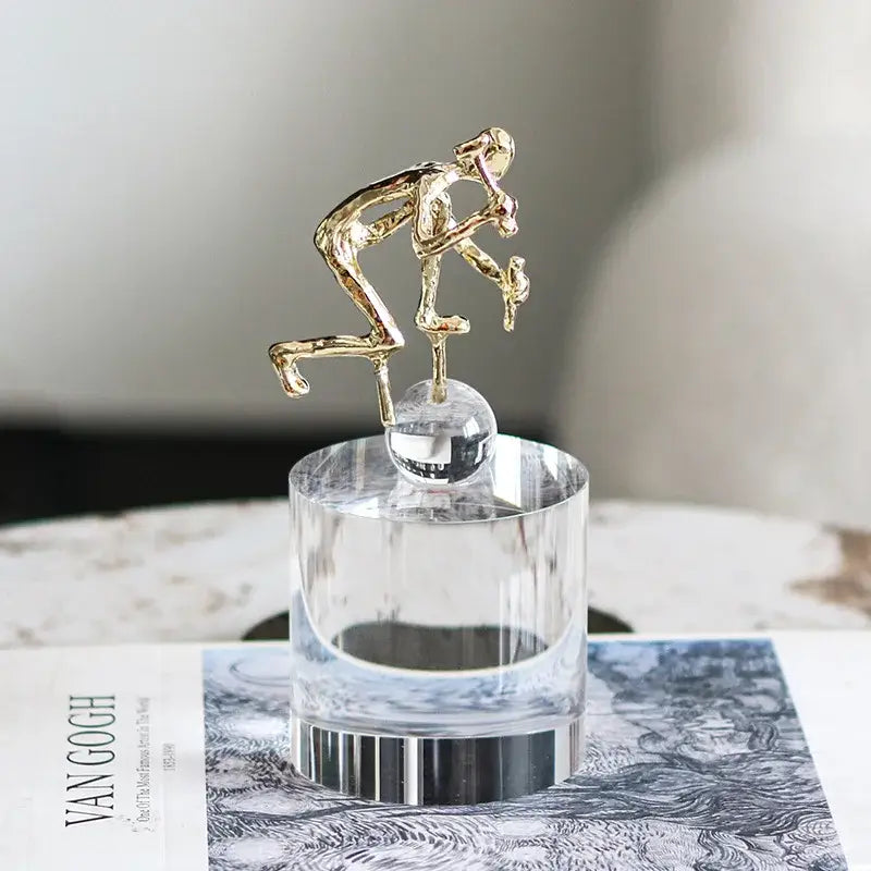 Modern gold geometric crystal worker figurine sculpture on clear crystal base for elegant living room decorbites decor