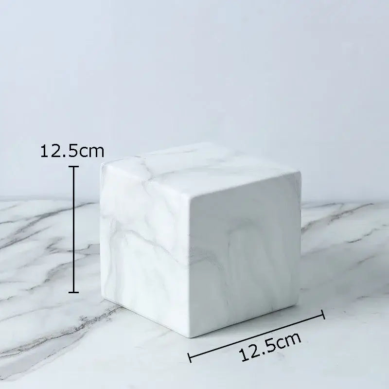 Modern gold geometric cube round statue decor featuring a white marble cube with gray veining measuring 12.5cm sides