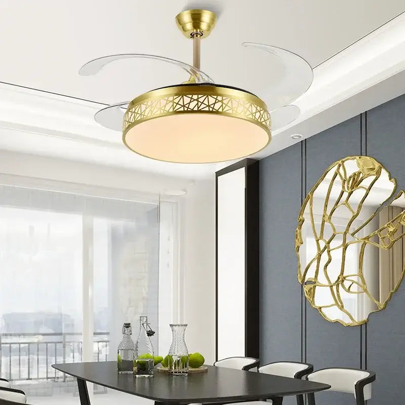 Modern gold decorbites ceiling fan with transparent blades and geometric LED light fixture for living room use