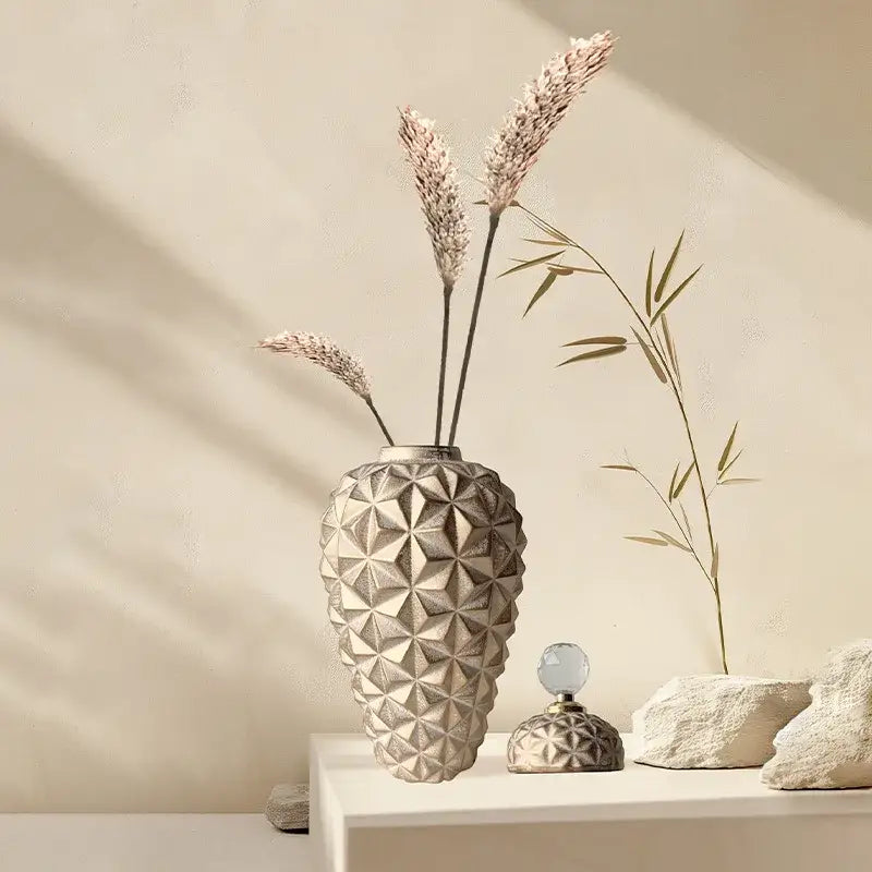Beige geometric diamond ceramic vase with textured faceted design for modern gold geometric diamond decorbites living room decor