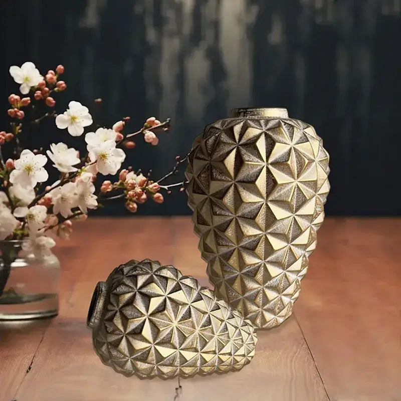 Two metallic gold geometric diamond ceramic vases for modern living room decor by decorbites
