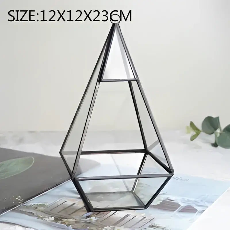 Black-framed decorbites geometric glass terrarium with a triangular multi-tiered design for modern decorbites geometric vase use