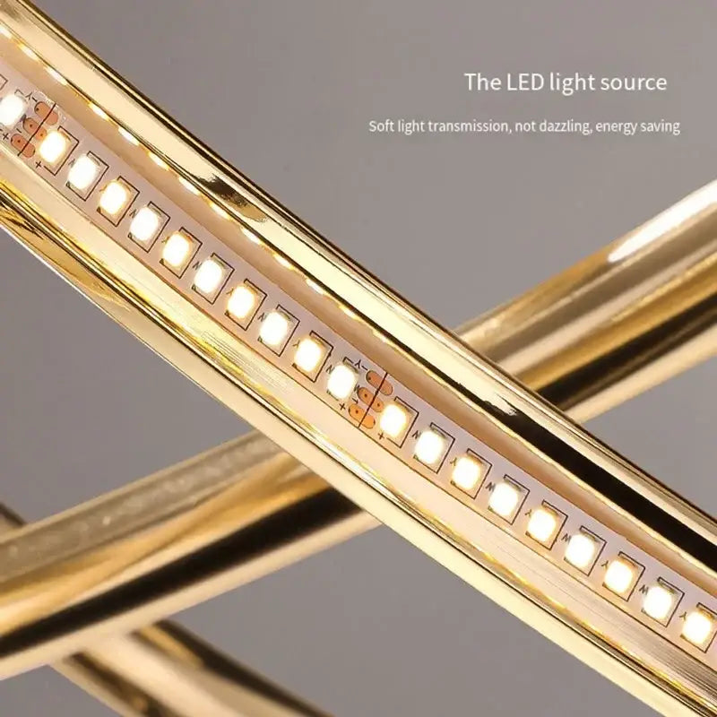 Modern gold geometric led ceiling pendant light with gold led strip embedded in metallic tubing for dining room decorbites geometric led