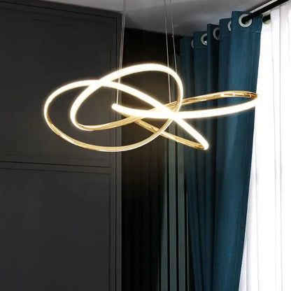 Modern gold geometric led ceiling pendant light featuring gold-toned intertwined circular rings for dining room decorbites geometric led