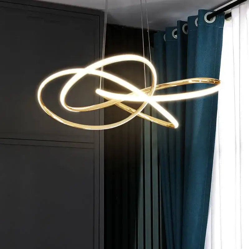 Modern gold geometric led ceiling pendant light featuring gold-toned intertwined circular rings for dining room decorbites geometric led