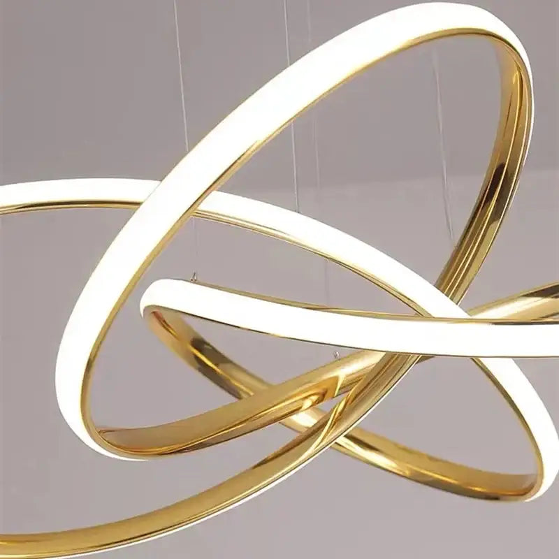 Modern gold and white interlocking ring pendant light fixture for dining room decorbites geometric led ceiling lighting