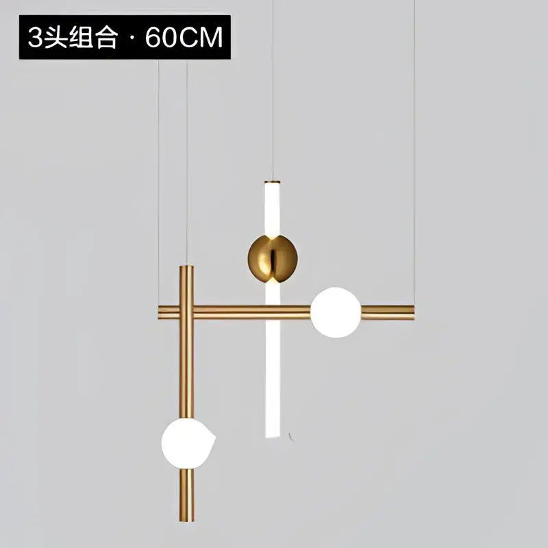 Modern brass and white pendant lights with geometric line frame and glass globe for dining room lighting