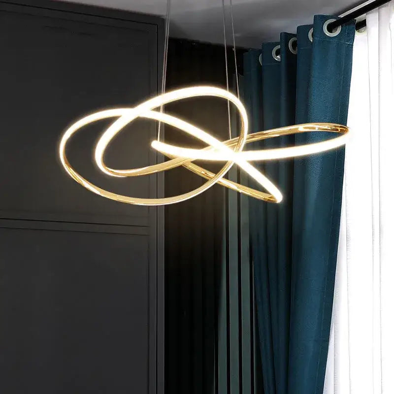 Modern gold geometric line led chandelier featuring a gold-toned intertwined circular design for dining room decorbites geometric line