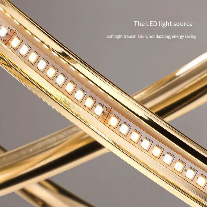 Modern gold geometric line led chandelier with gold-colored led light strip embedded in metallic frame for dining room decorbites geometric line