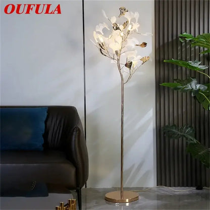 Oufula floor lamp with slender gold metal stem and white ginkgo flower light fixtures for modern living room decorbites ginkgo flower
