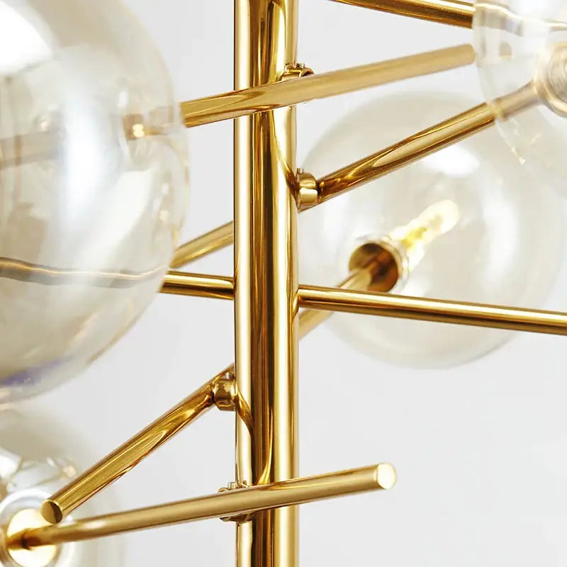 Modern gold glass ball iron chandelier with clear glass globe bulbs for elegant living room decorbites glass ball lighting