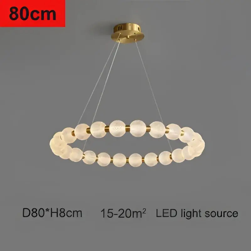 Modern gold ceiling chandelier with frosted decorbites glass ball led spheres suspended by thin cords for living room decor