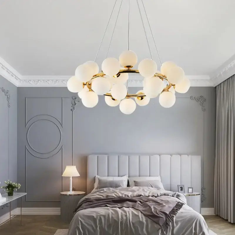 Modern gold glass ball led chandelier with a metal frame and frosted glass globes for dining room decorbites glass ball lighting