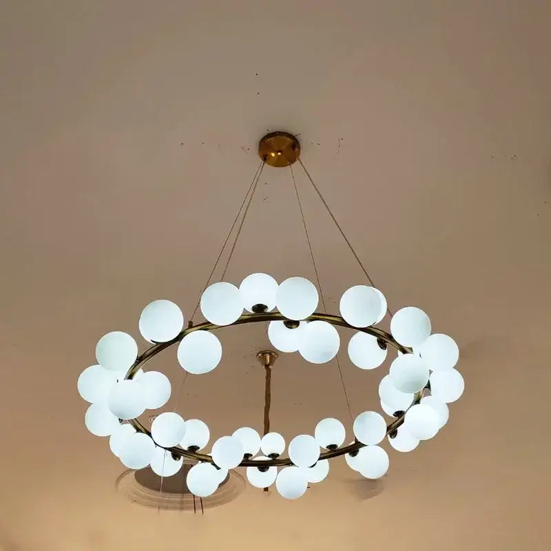Modern gold glass ball led chandelier with circular frame and frosted globe bulbs for dining room decorbites glass ball