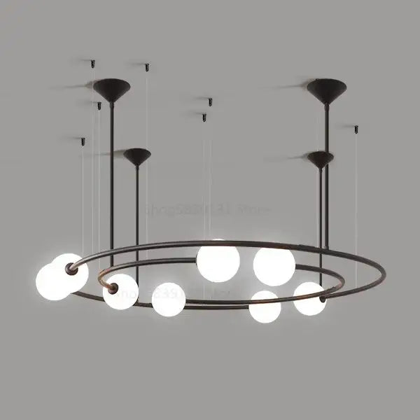 Modern black metal chandelier with multiple spherical white glass ball bulbs in a circular decorbites glass ball led design