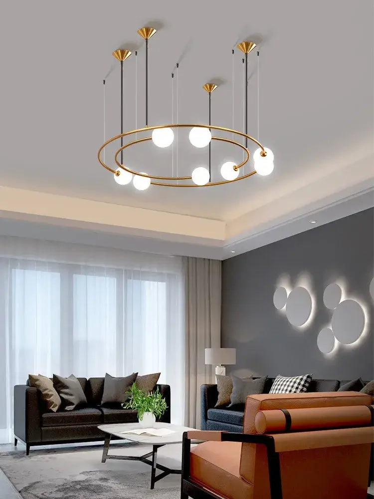 Modern gold glass ball led chandelier with two concentric circular frames and spherical bulbs for living room decorbites glass ball