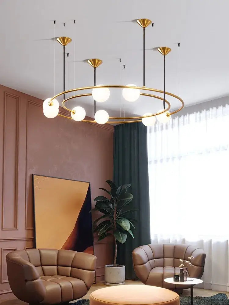 Modern gold glass ball led chandelier with multiple spherical bulbs and slender black rods for living room decorbites glass ball