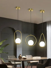 Modern gold glass ball led pendant light with sleek oval and circular frames for dining room decorbites pendant light