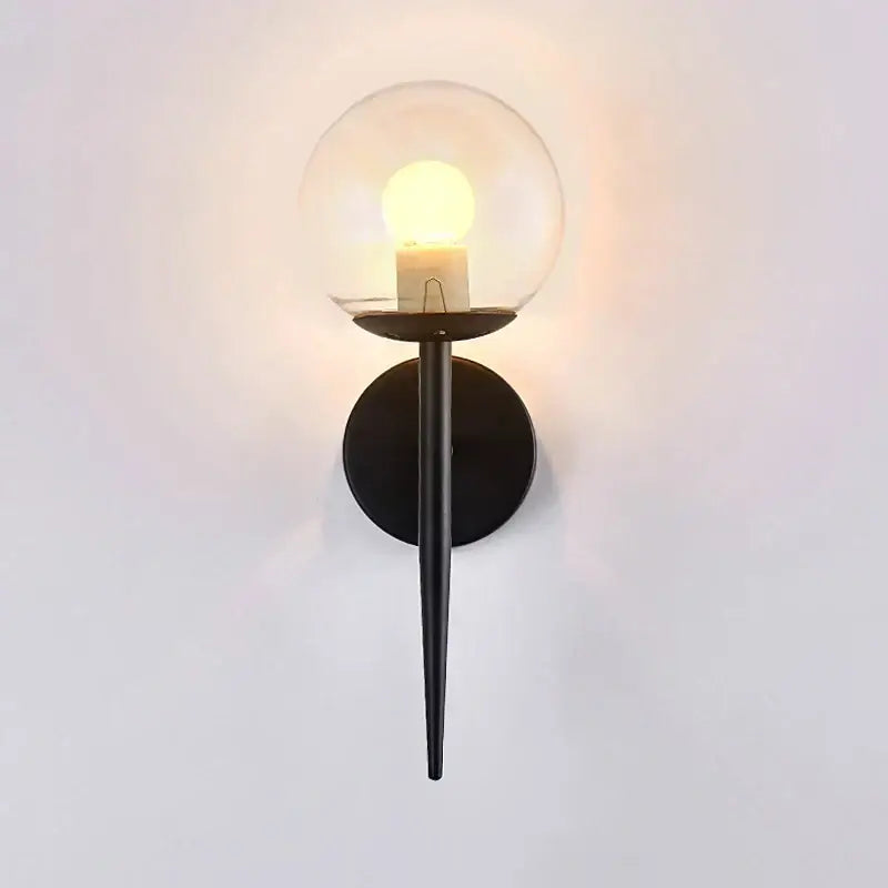 Modern black metal wall light with clear glass ball led globe for bedroom passage decorbites glass ball lighting