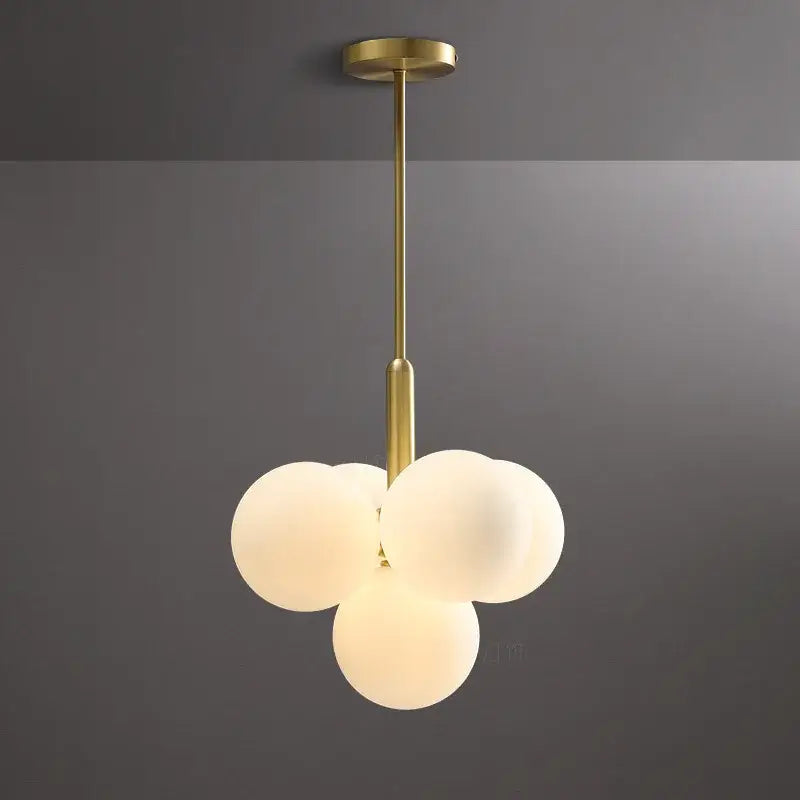 Modern gold glass ball pendant chandelier featuring three frosted glass spheres for dining room decorbites glass ball light