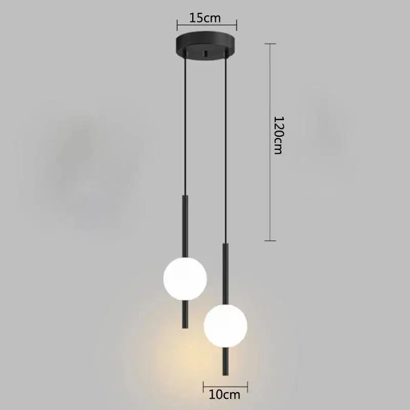 Modern black pendant light with two white glass ball bulbs suspended from a circular ceiling mount decorbites glass ball pendant