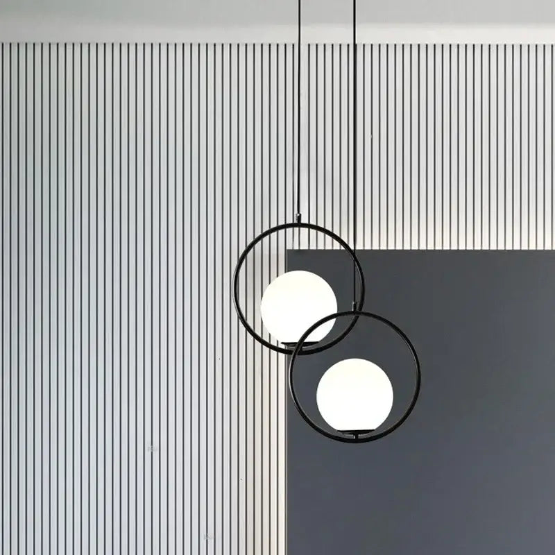 Modern black circular pendant light with frosted glass spheres for dining room decorbites glass ball pendant fixture