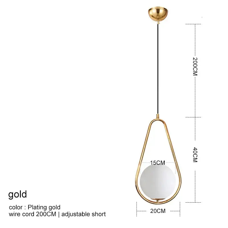 Modern gold glass ball pendant light with a gold-plated teardrop pendant and white glass globe by decorbites glass ball