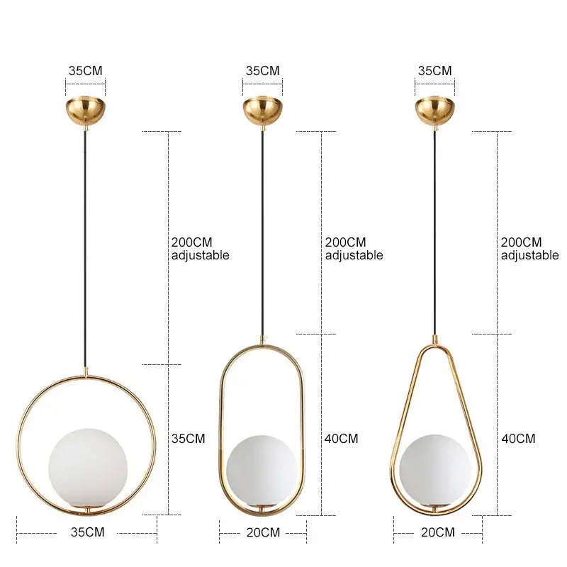Three modern gold glass ball pendant lights with geometric frosted glass globes for dining room decorbites fixture