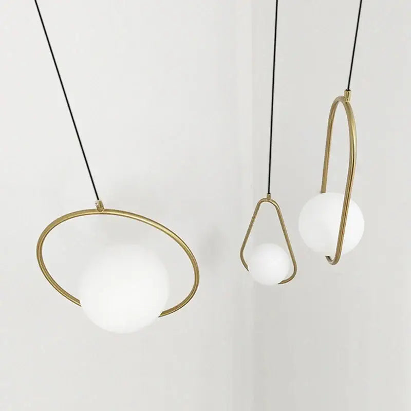 Modern gold glass ball pendant light with three frosted white glass spheres and metal frames for dining room decorbites glass ball pendant