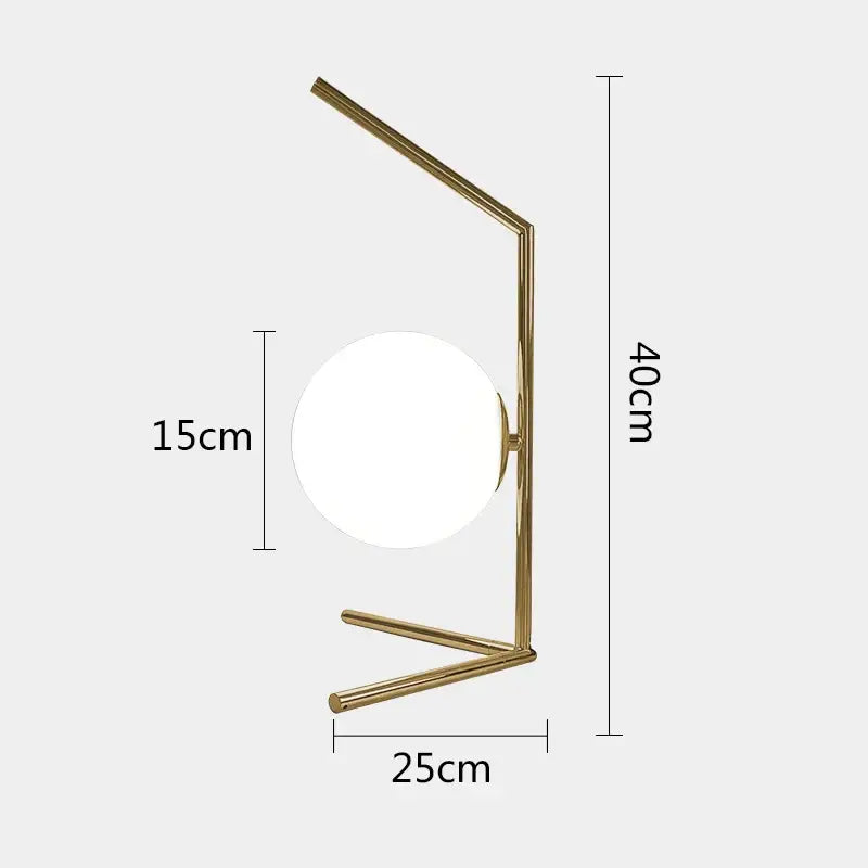 Modern gold glass ball table lamp with a sleek angular metal frame and frosted globe shade for bedroom decorbites decor