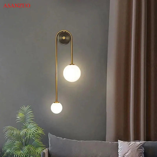 Modern gold glass ball wall lamp with dual frosted glass shades for bedroom decorbites glass ball sconce