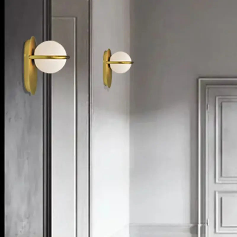 Modern gold glass ball wall light with frosted glass shade and minimalist bar accent for bedroom decorbites glass ball
