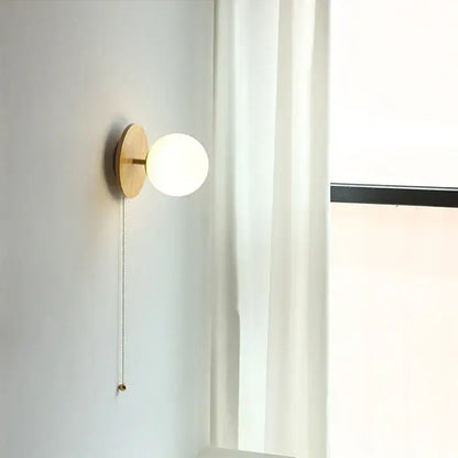 Minimalist wall lights with a round frosted glass ball and natural wood base perfect for bedroom decorbites glass ball