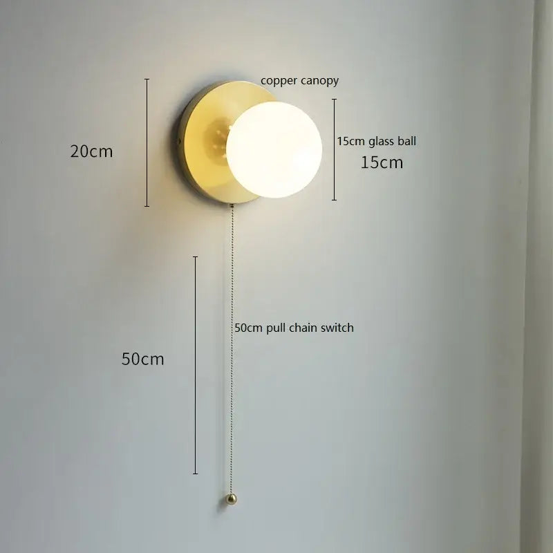 Copper canopy wall light with 15cm glass ball and 50cm pull chain switch by decorbites for bedroom decor