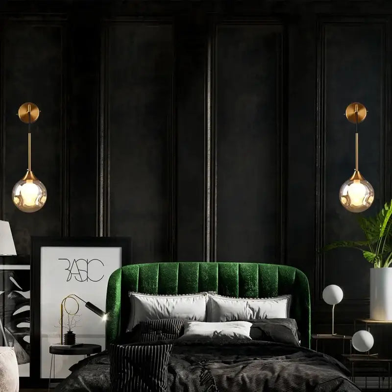 Emerald green velvet headboard with tufted design complemented by modern gold glass ball wall sconce decorbites glass ball