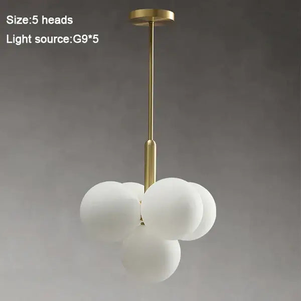 Modern gold glass balls chandelier with brass finish and five frosted white glass globe shades for dining room decorbites glass balls