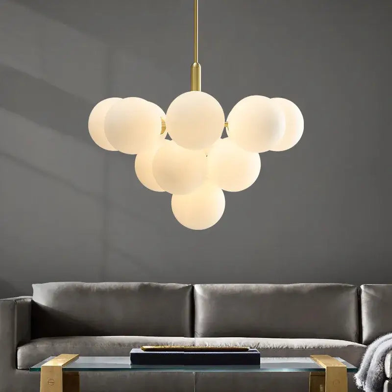 Modern gold glass balls chandelier with frosted glass spheres and brass accents for dining room decorbites glass balls
