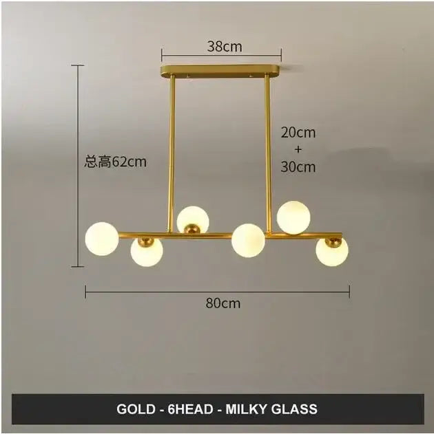 Modern gold glass balls chandelier featuring six spherical milky glass fixtures for dining room decorbites glass balls design
