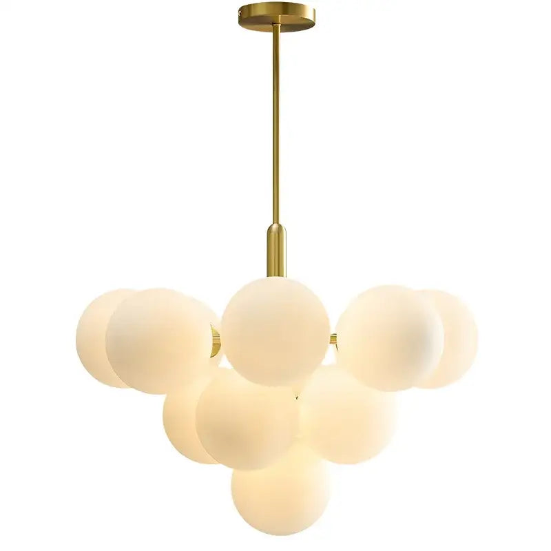 Modern gold glass balls chandelier featuring frosted glass spheres in a clustered design for dining room decorbites glass balls
