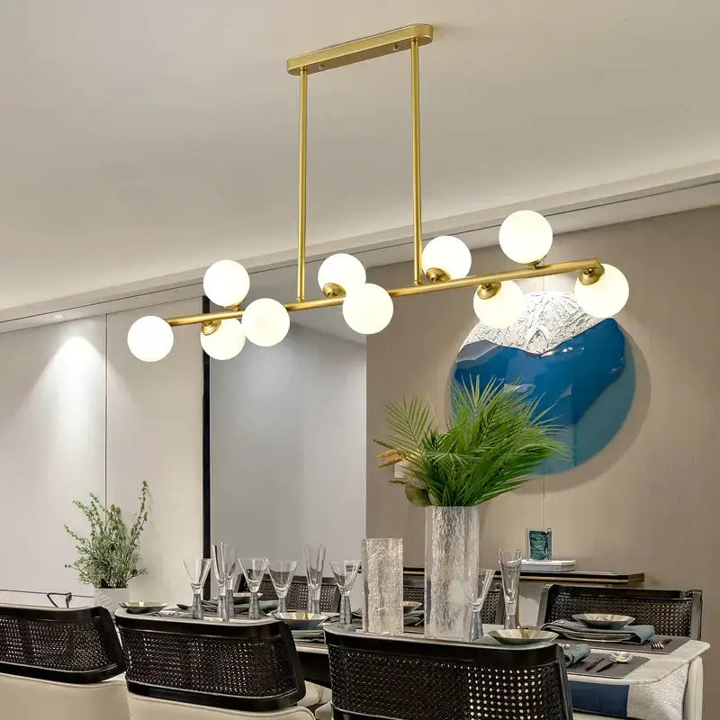 Modern gold glass balls chandelier featuring spherical white glass bulbs ideal for dining room decorbites glass balls