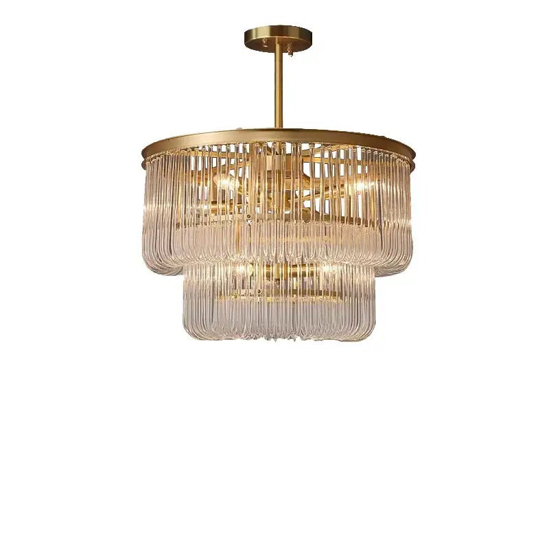 A modern two-tiered decorbites glass bar chandelier with gold metal frames and clear glass prisms for luxury lighting
