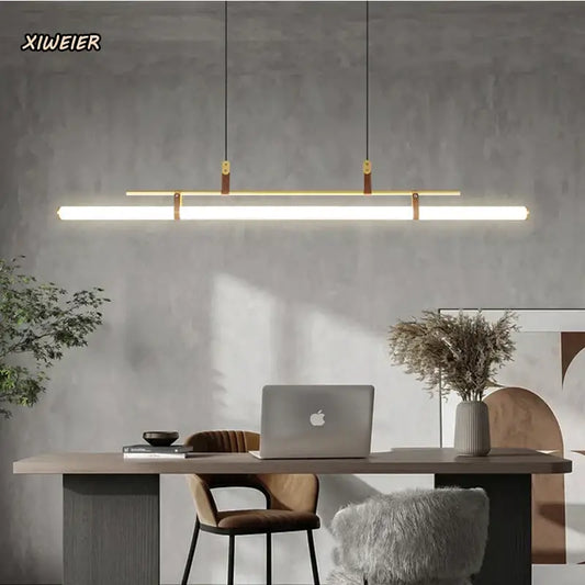 Modern gold glass belt chandelier led pendant light with gold-toned linear design and leather accents for dining room decorbites glass belt