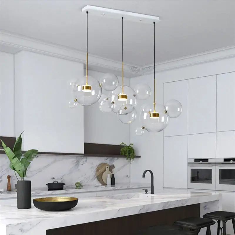 Modern gold glass bubble ball led chandelier with glass bubble decorbites and gold-toned metal for dining room light