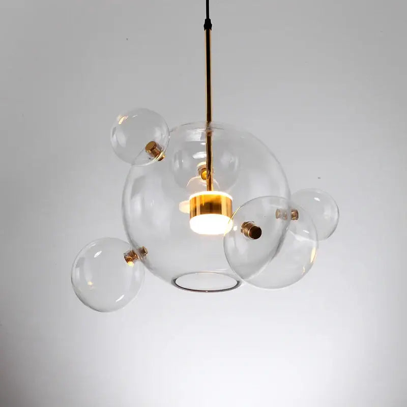 Modern gold glass bubble ball led chandelier with brass accents and central bulb for dining room decorbites glass bubble