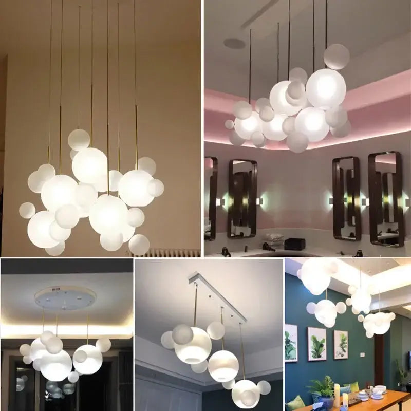 Modern gold glass bubble chandelier featuring white frosted glass globe pendant lights with gold-toned rods decorbites glass bubble