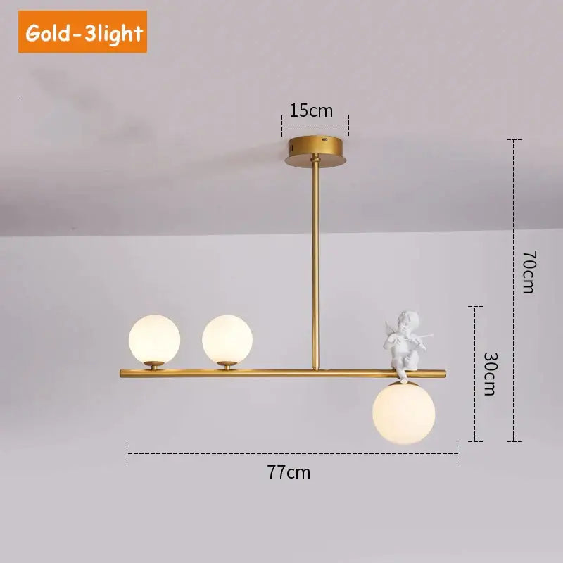 Modern gold glass bubble pendant light with three frosted globe lights and a white cherub decorbites figurine