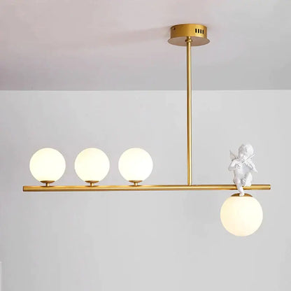 Modern gold glass bubble pendant light with three frosted glass globes and a white cherub decorbites glass bubble detail
