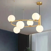 Modern gold glass chandelier g9 hanging light with six frosted globe lights in a circular pattern for living room